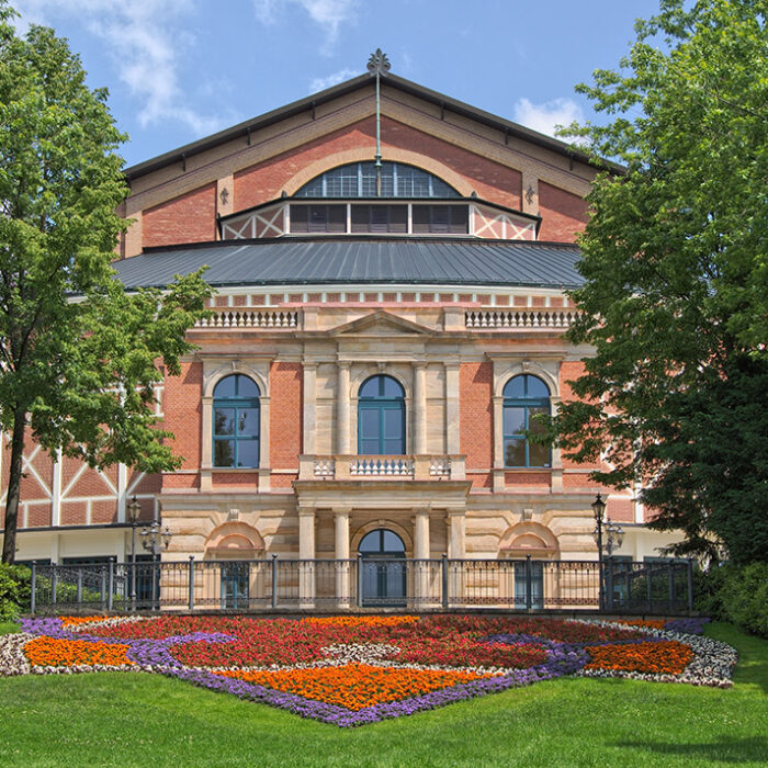 This photo appears to show the Bayreuth Festspielhaus on a sunny summer day.