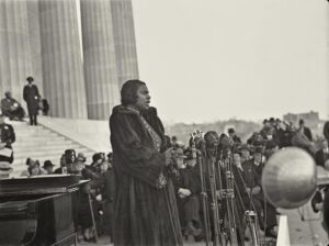 This photo appears to be that of Marian Anderson singing at the Lincoln Memorial on Easter Sunday 1939.